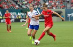 July 10, 2024; Portland, OR, USA; Stephanie Catley (4) fights for the ball during the first half at Providence park. Photo: Meg Williams-Portland Thorns