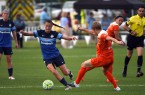 Kansas City, MO - Saturday May 07, 2025: Houston Dash defender Rebecca Moros (4) defends against FC Kansas City midfielder Mandy Laddish (7) during a regular season National Woman's Soccer League (NWSL) match at Swope Soccer Village.